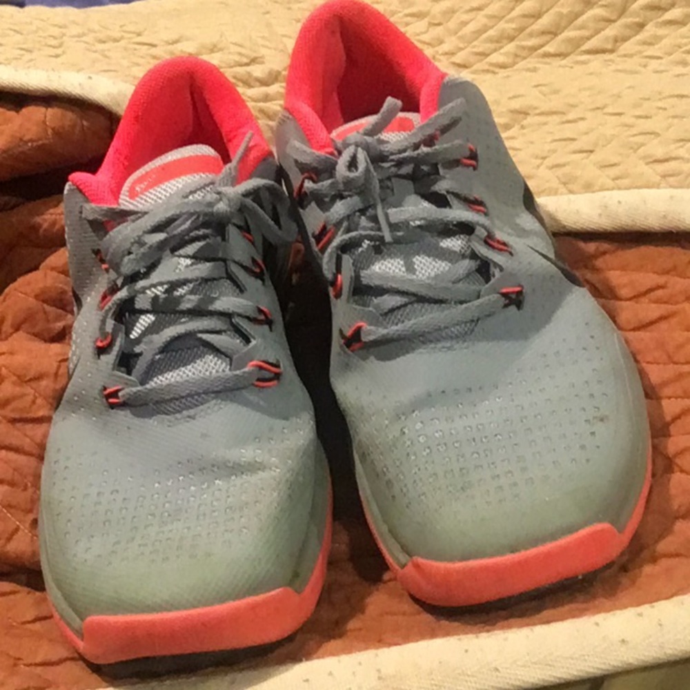 Nike orange and grey golf shoes